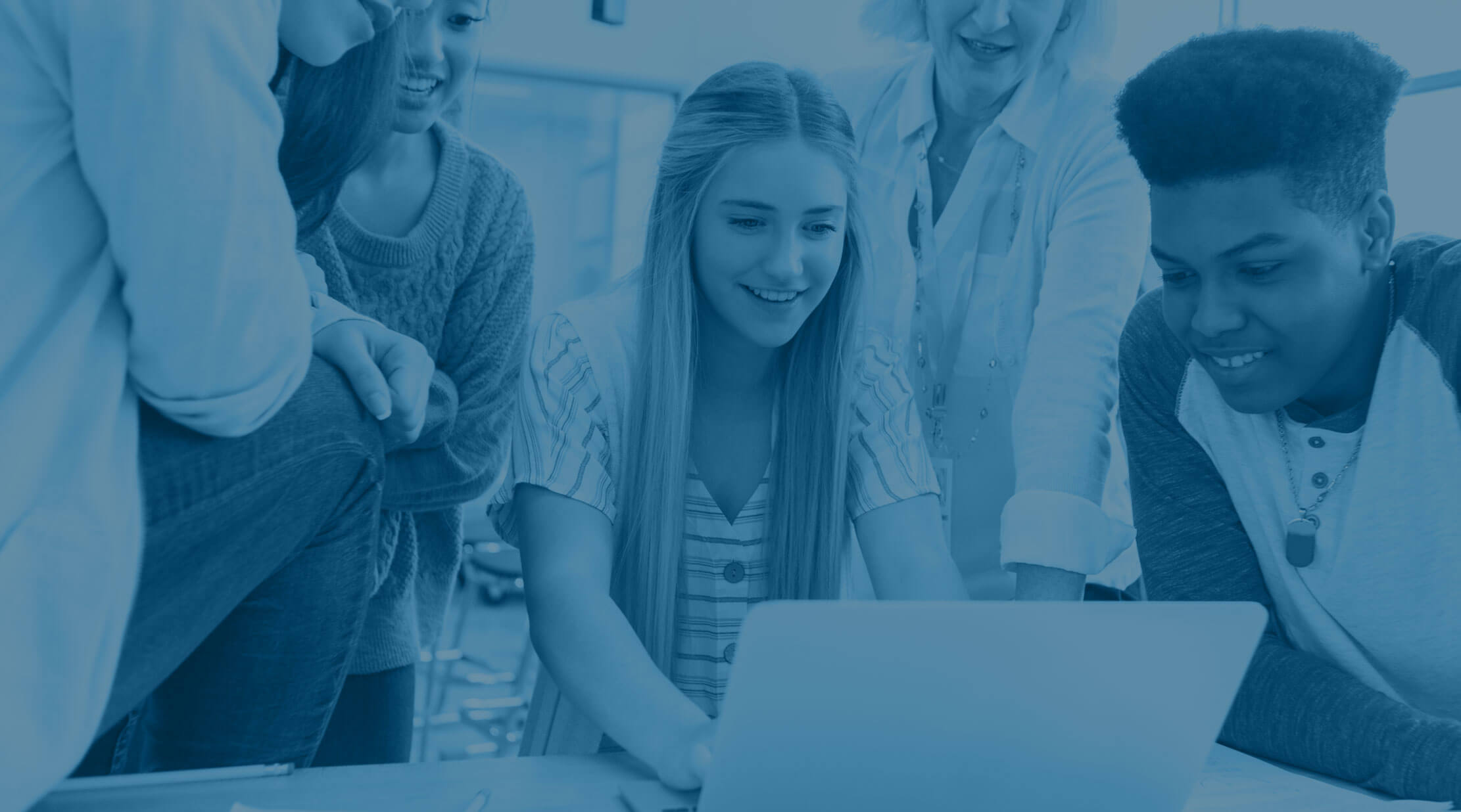 Students working together at a computer